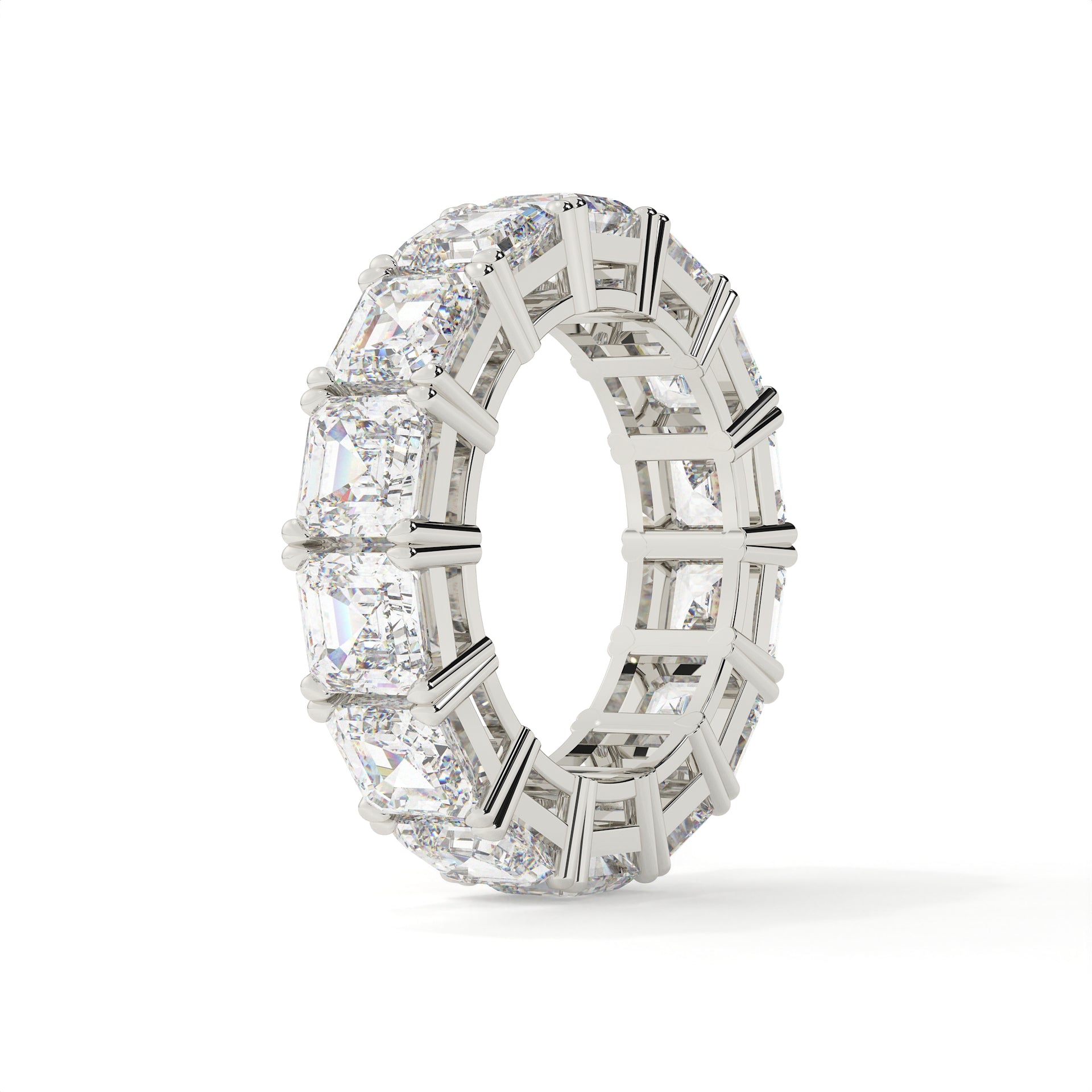 Silver ring with multiple diamonds on a white background