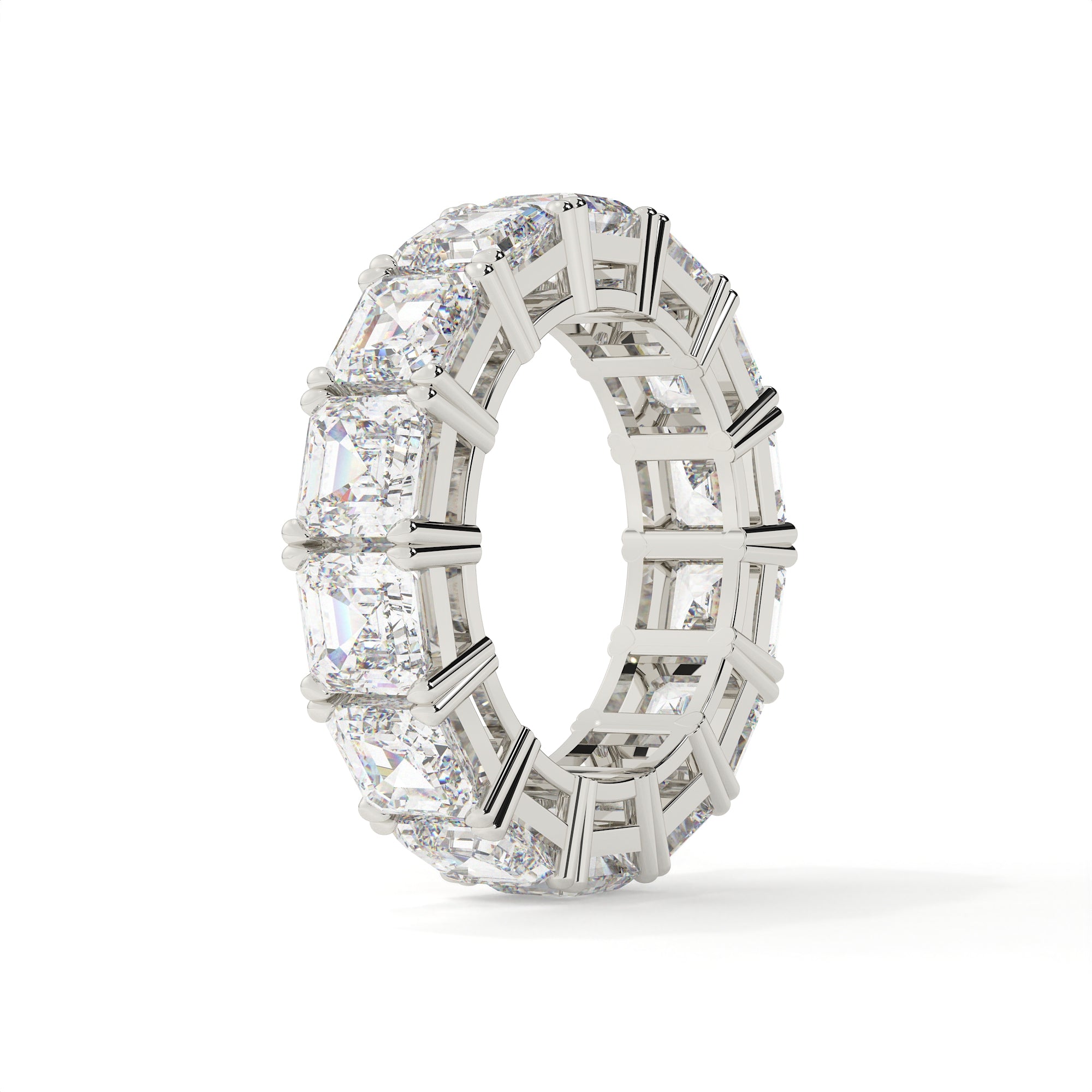 Silver ring with multiple diamonds on a white background
