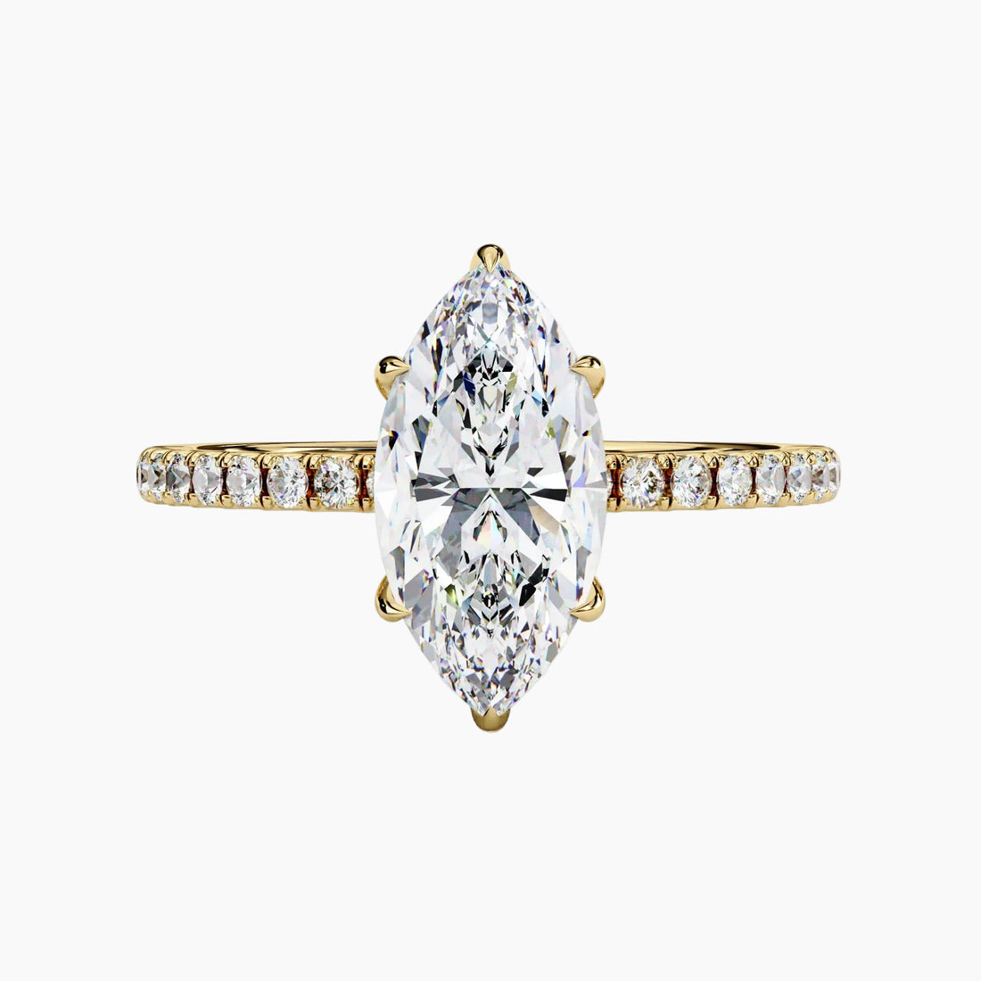 Gold ring with a large marquise-shaped diamond and smaller diamonds on the band against a white background