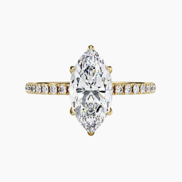 Gold ring with a large marquise-shaped diamond and smaller diamonds on the band against a white background