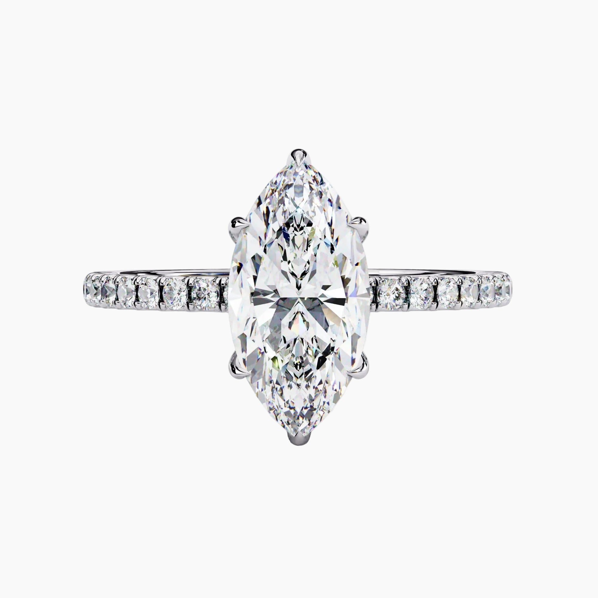 Diamond ring with a pear-shaped center stone on a white background