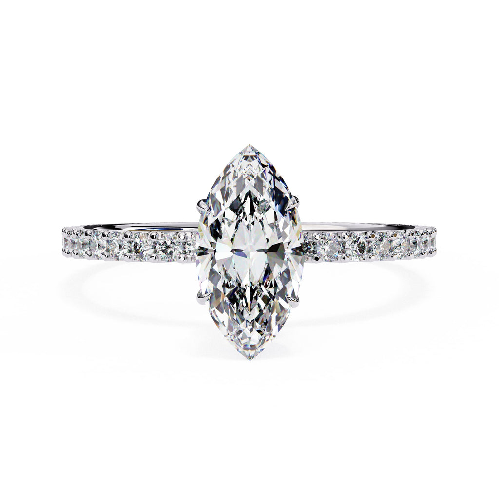 Diamond ring with a pear-shaped center stone on a white background