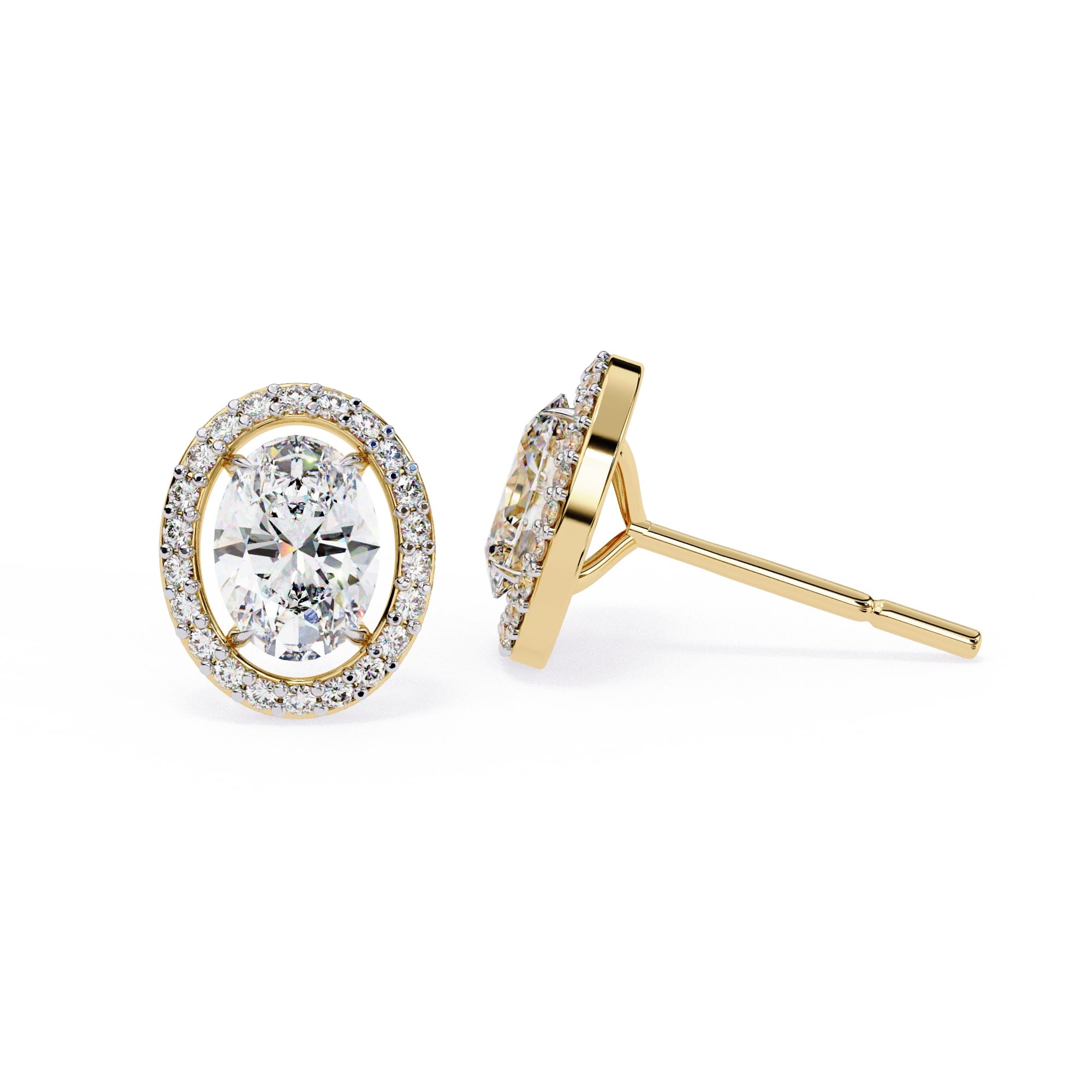 Gold earrings with clear gemstones on a white background