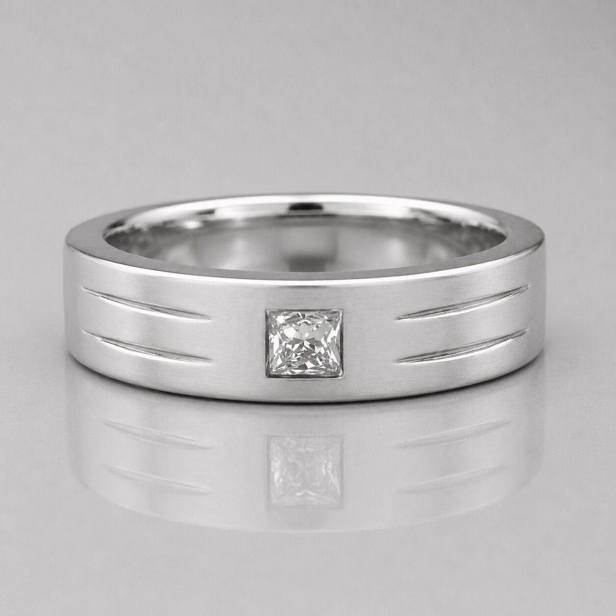 Lab grown princess cut single diamond men's ring featuring a satin-finish white gold band with a princess cut solitaire diamond and engraved side accents.