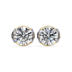 Pair of diamond stud earrings on a white background