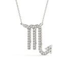 Silver necklace with a letter 'T' pendant on a white background