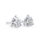 Pair of diamond stud earrings on a white background
