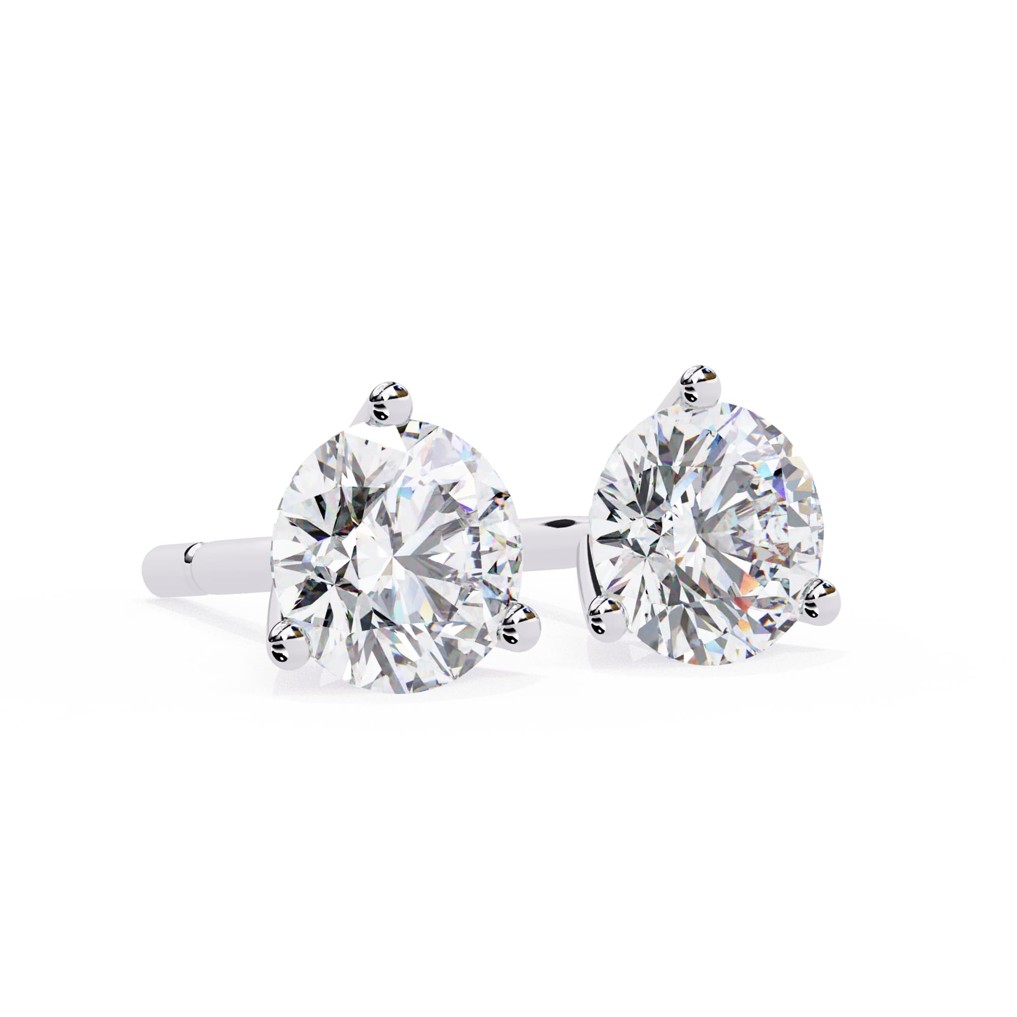 Pair of diamond stud earrings on a white background