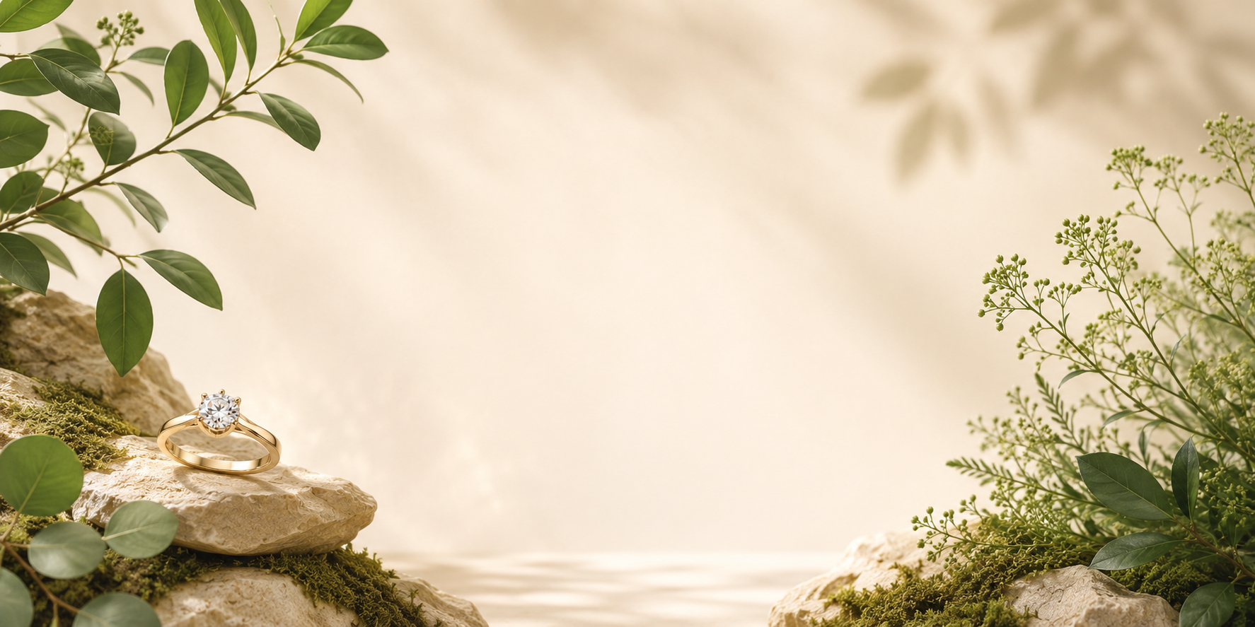 Two wedding rings on a rock with greenery in the background