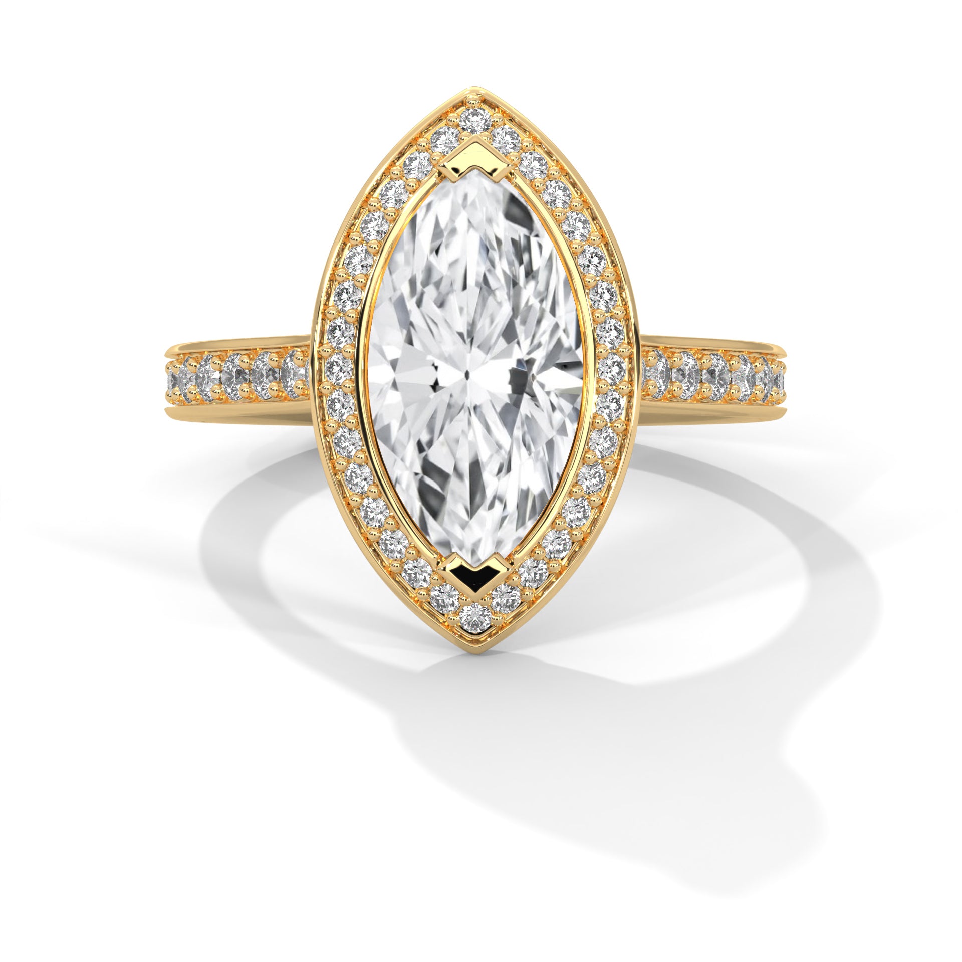 Gold ring with a large diamond and smaller diamonds on the band against a white background