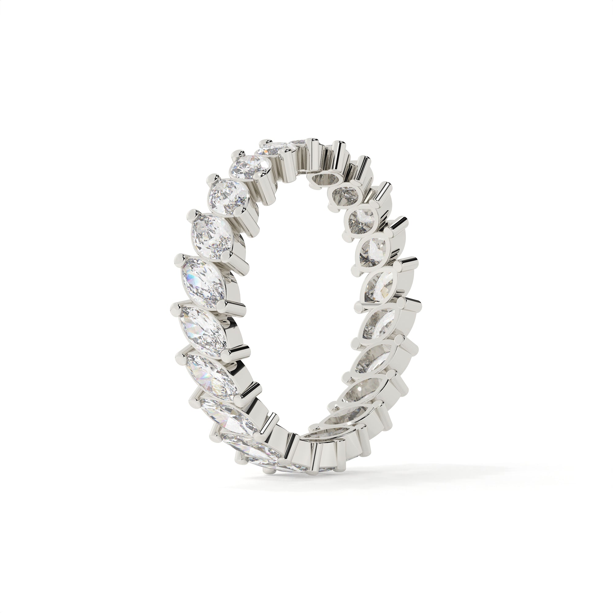 Silver ring with diamond accents on a white background