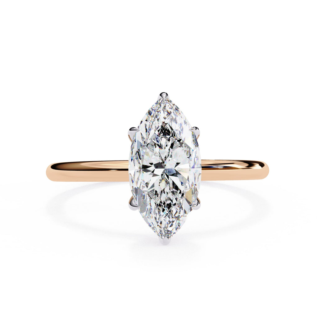 Rose gold ring with a marquise-shaped diamond on a white background