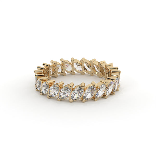 Gold bracelet with clear gemstones on a white background