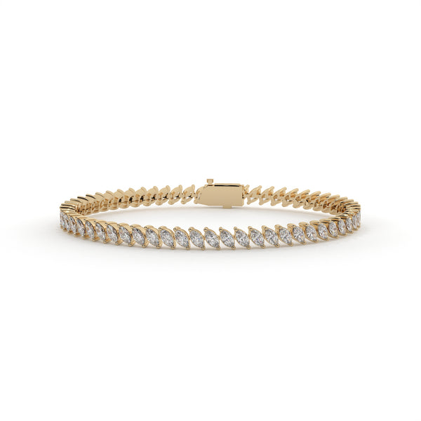 Gold bracelet with diamond accents on a white background
