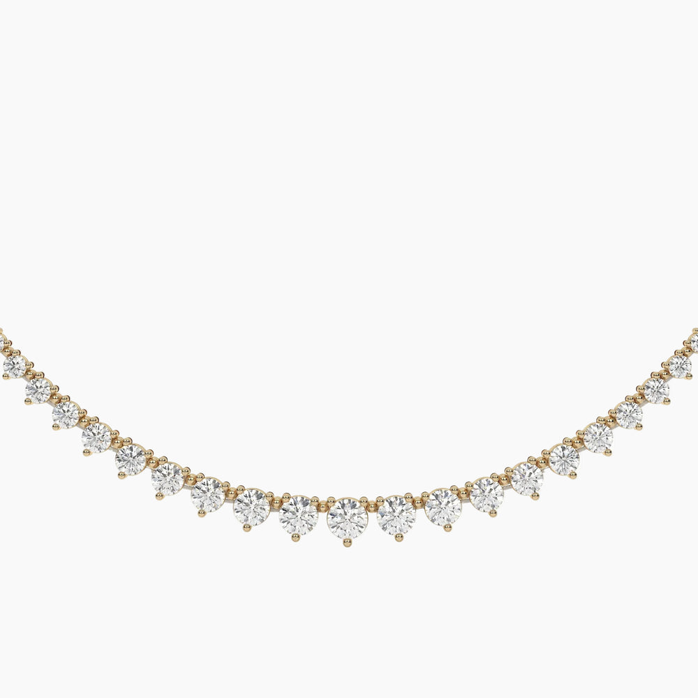 Gold and diamond necklace on a white background