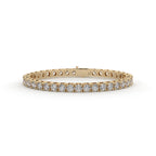 Gold bracelet with diamonds on a white background