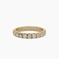 Gold ring with diamonds on a white background