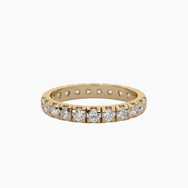 Gold ring with diamonds on a white background