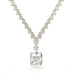 Diamond necklace with a large central gemstone on a white background