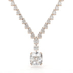 Diamond necklace with a large central gemstone on a white background