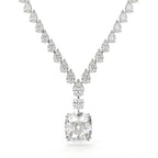 Diamond necklace with a large central gemstone and smaller stones on a white background