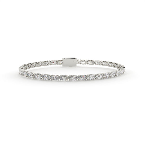 white gold bracelet with clear stones on a white background