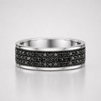 Multiple round cut black diamond men's eternity pavé ring featuring rows of black diamonds set in a polished white gold band.