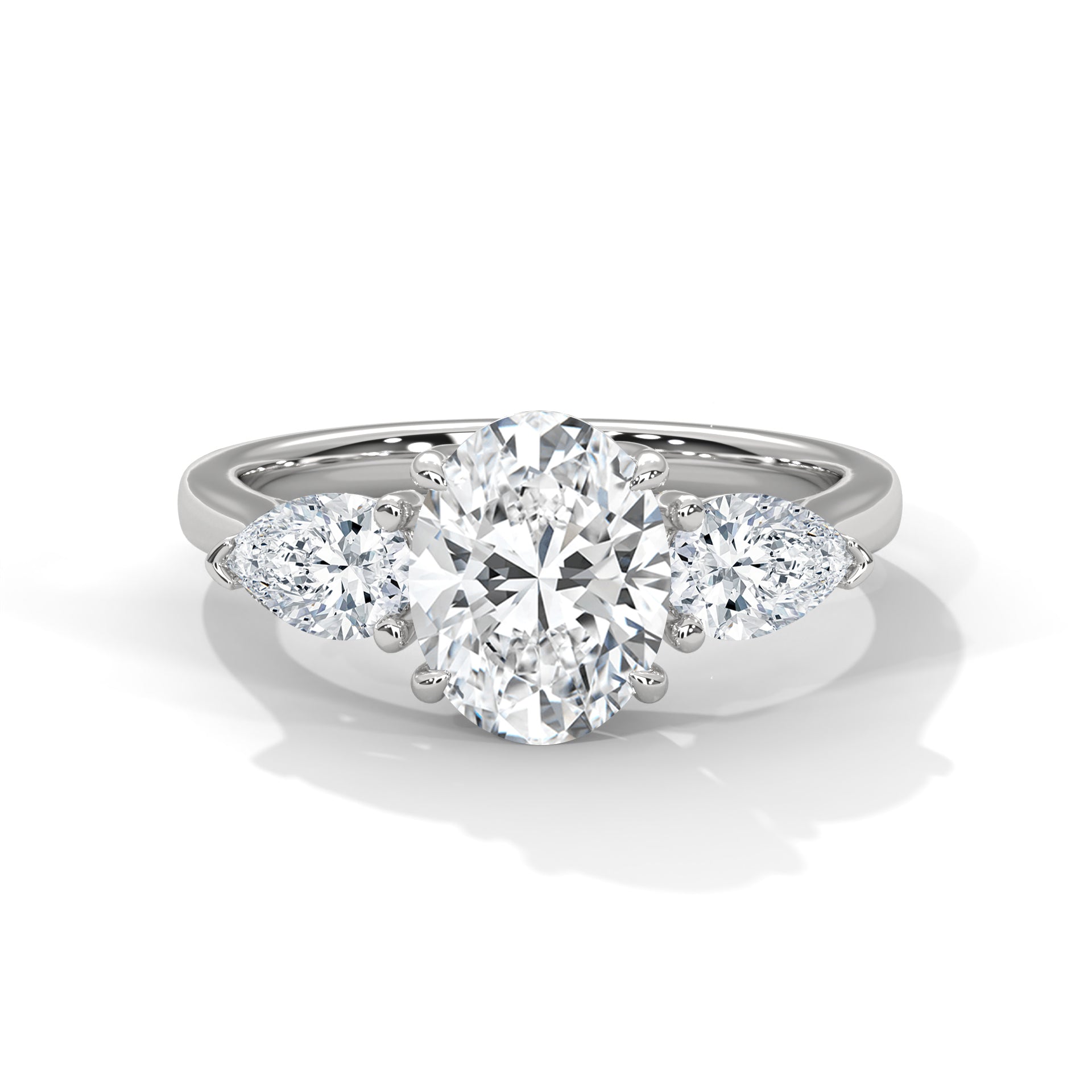 Diamond ring with a heart-shaped center stone on a white background