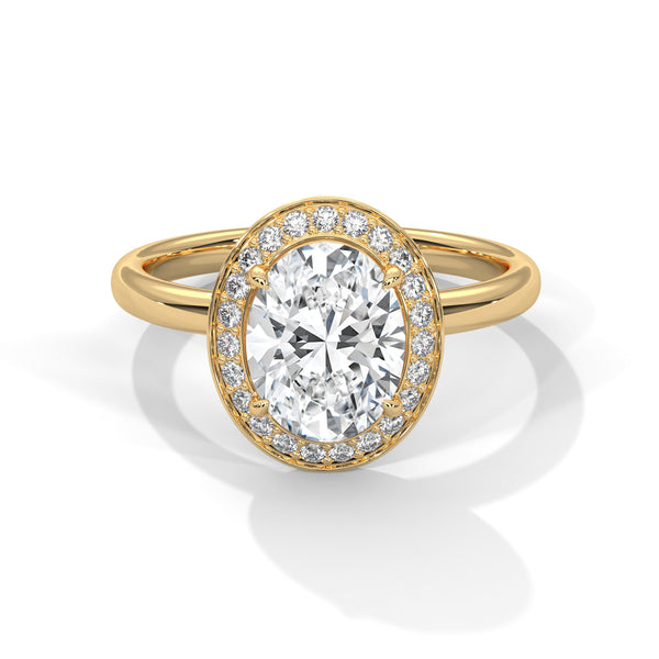 Gold ring with a large diamond and smaller diamonds around on a white background