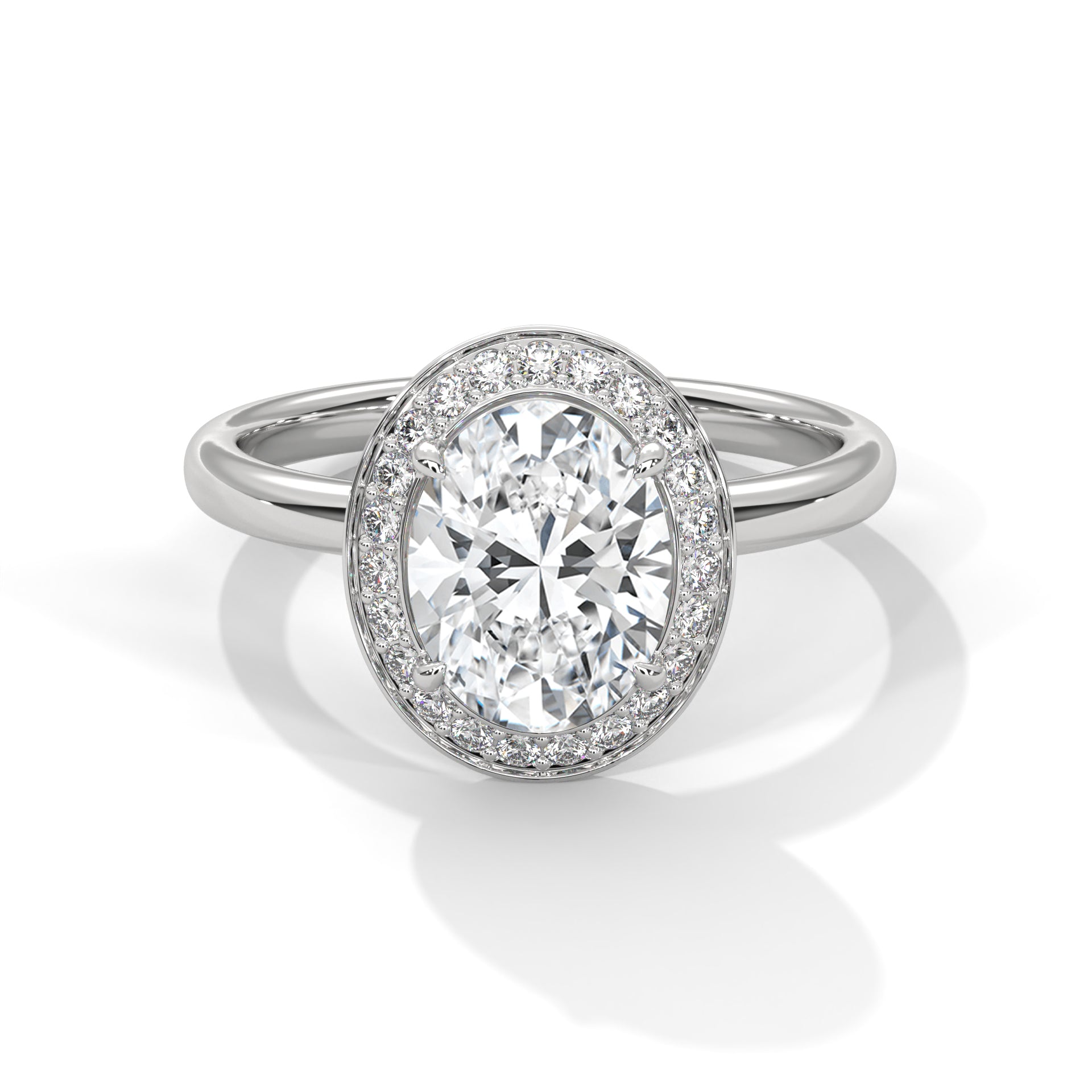 Diamond ring with a halo on a white background