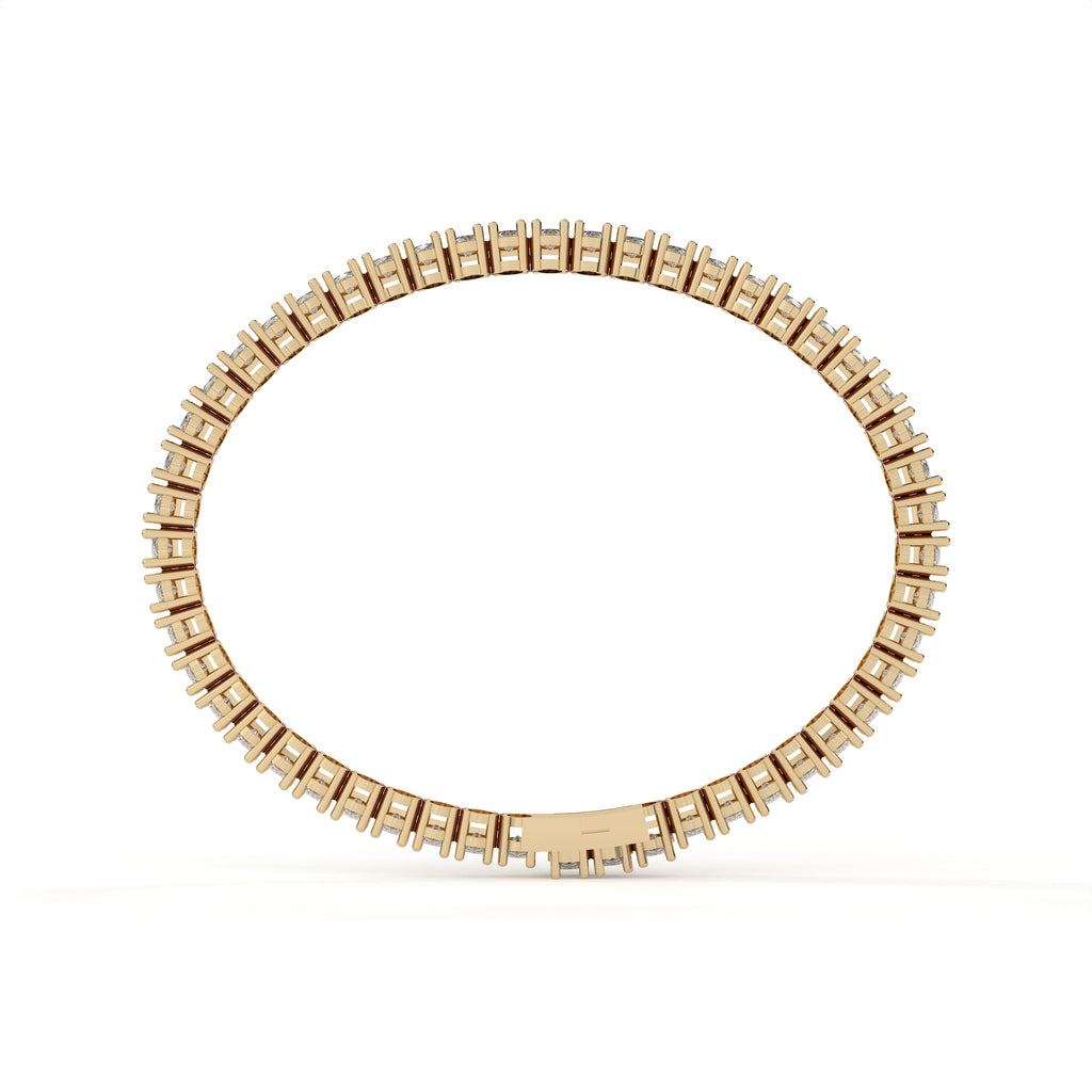 Gold ring with small square stones on a white background