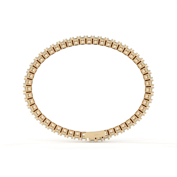 Gold ring with small square stones on a white background