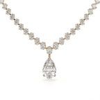 Diamond necklace with a teardrop pendant on a white background