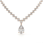 Diamond necklace with a teardrop pendant on a white background