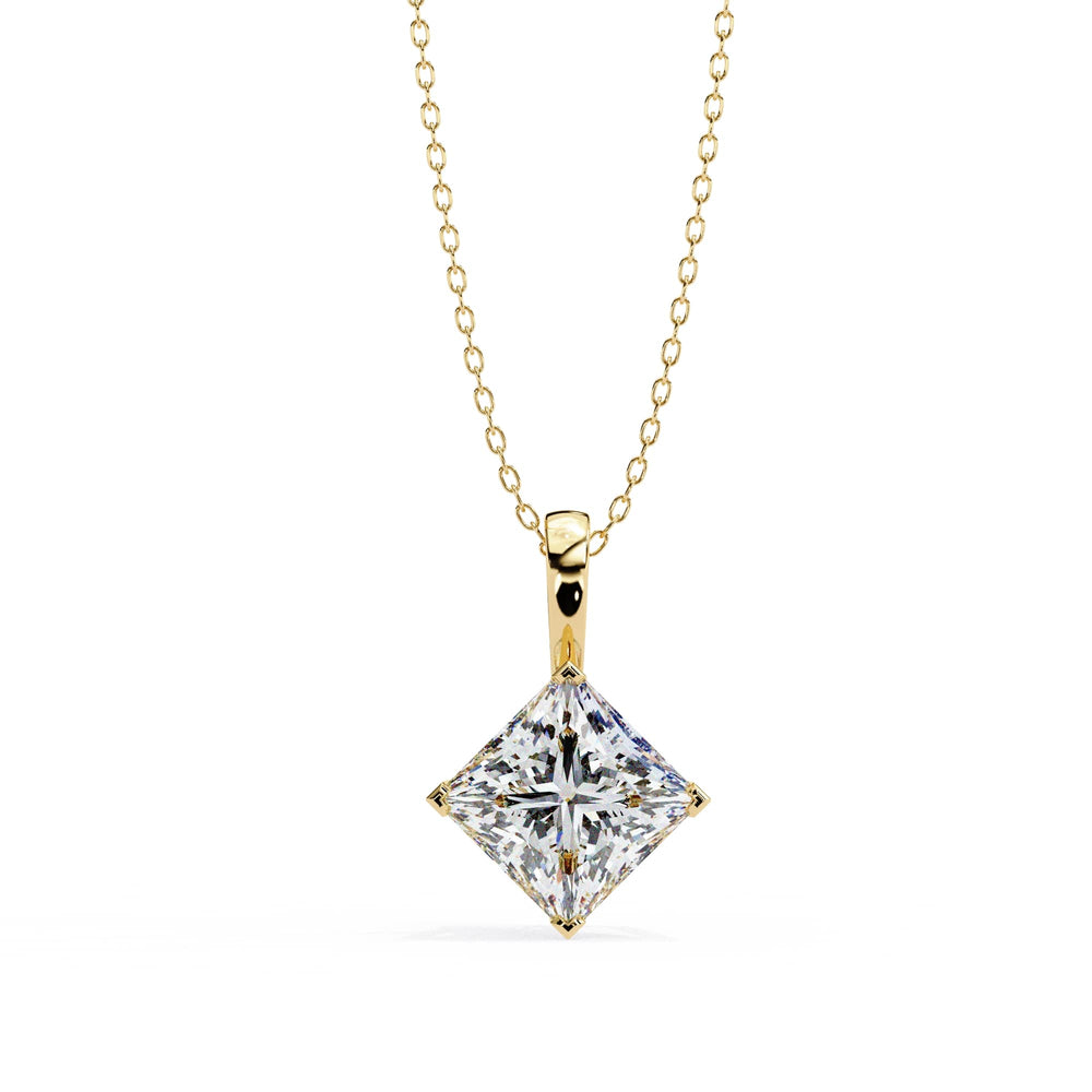 Gold necklace with a diamond pendant on a white background