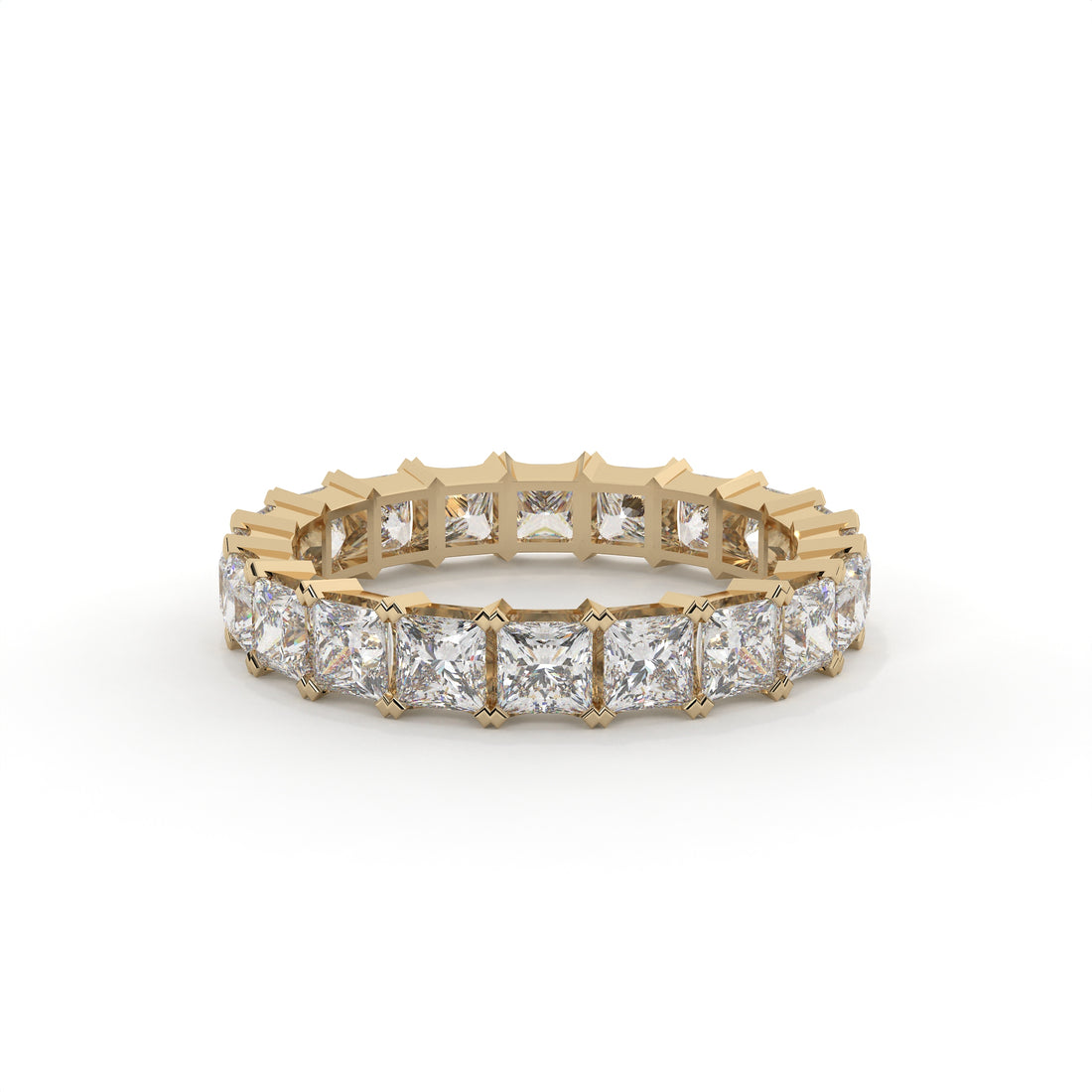 Gold ring with diamond stones on a white background