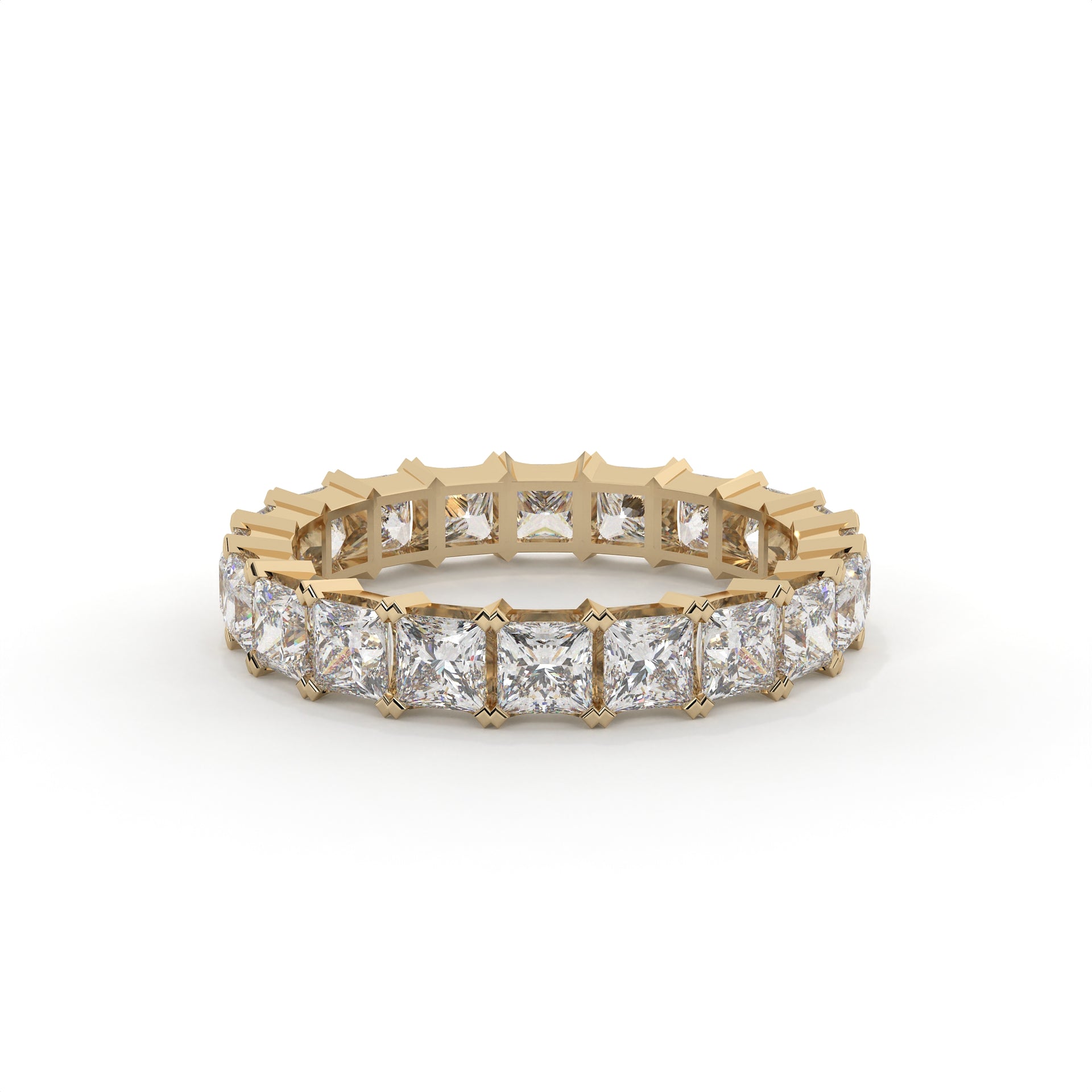 Gold ring with diamond stones on a white background