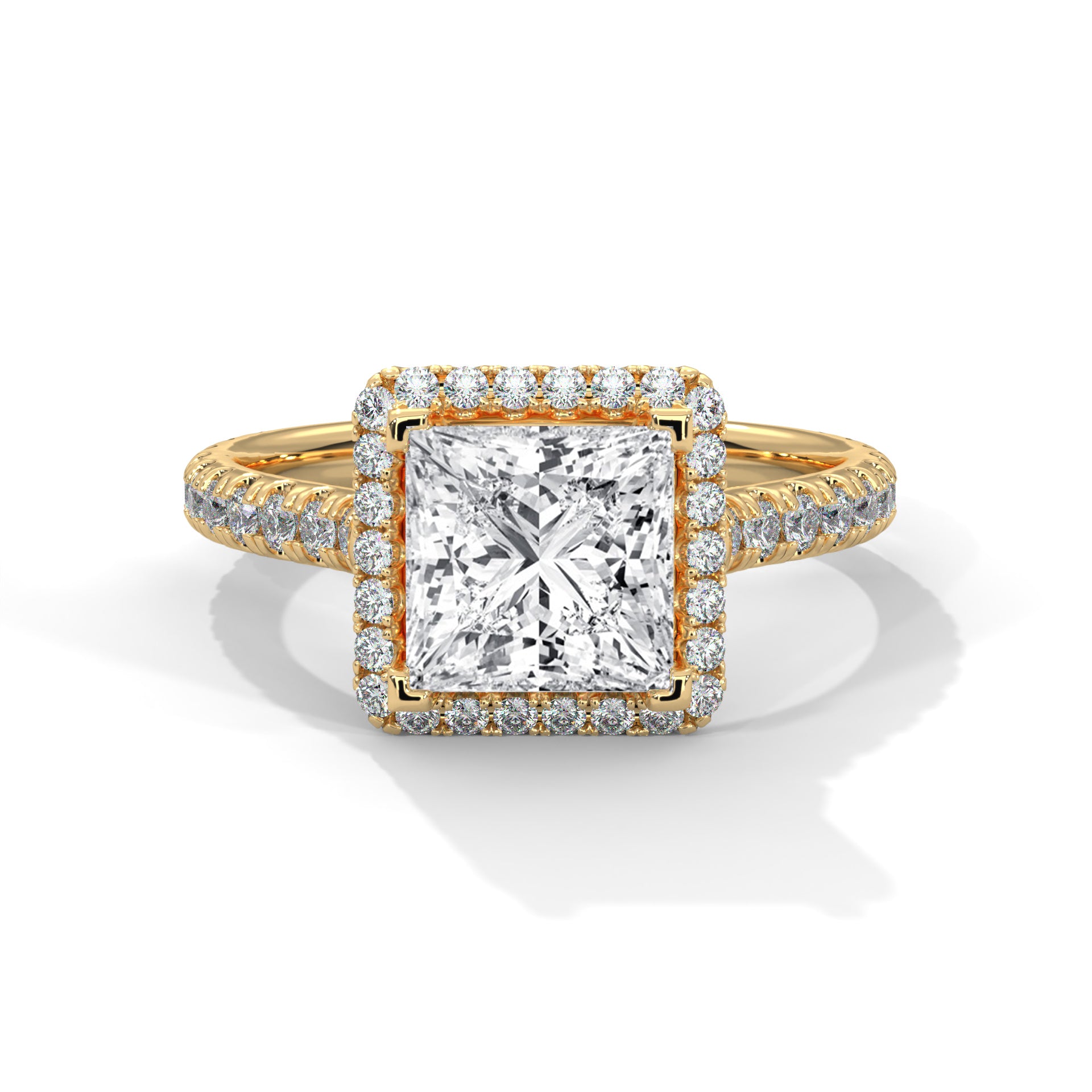 Gold ring with a large diamond and smaller diamonds on the band against a white background