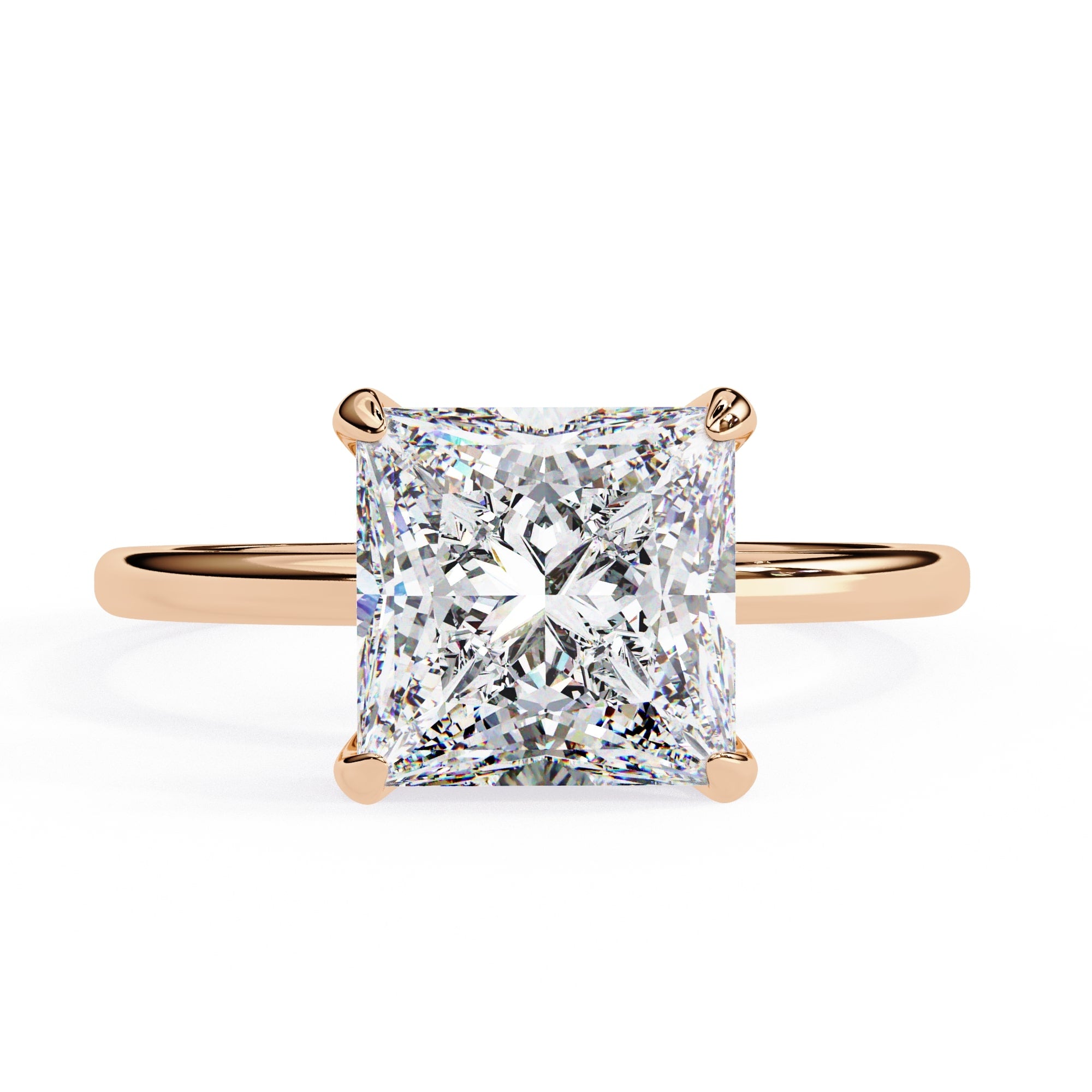 Rose gold ring with a large diamond on a white background