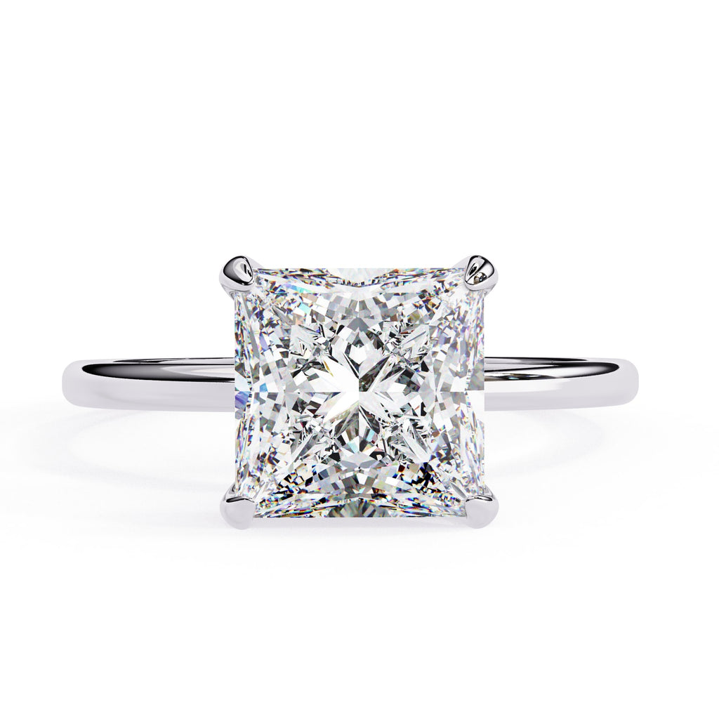 Diamond ring with a square-cut gemstone on a white background