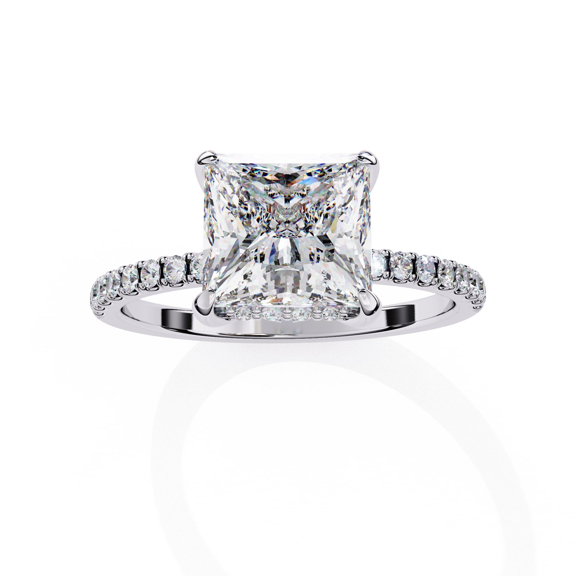 Diamond ring with a square-cut center stone on a white background