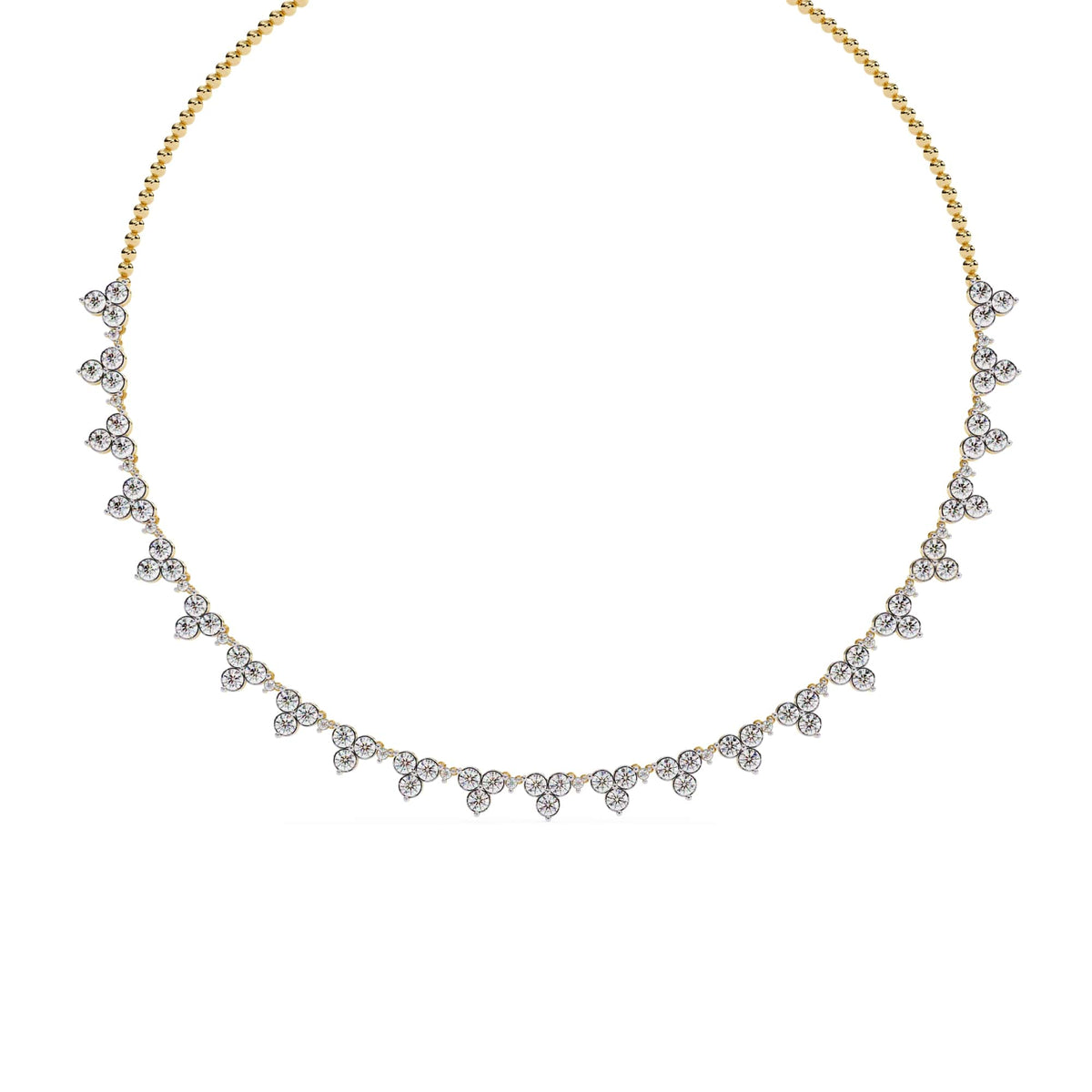 Gold necklace with diamond-like stones on a white background