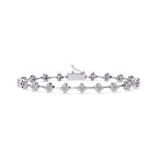 White gold bracelet with floral designs on a white background
