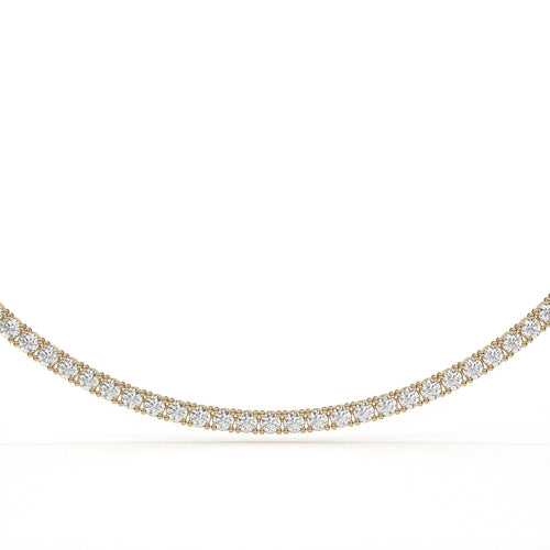 Gold necklace with diamonds on a white background