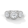 Diamond ring with three circular diamonds on a white background
