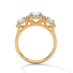 Gold ring with diamonds on a white background
