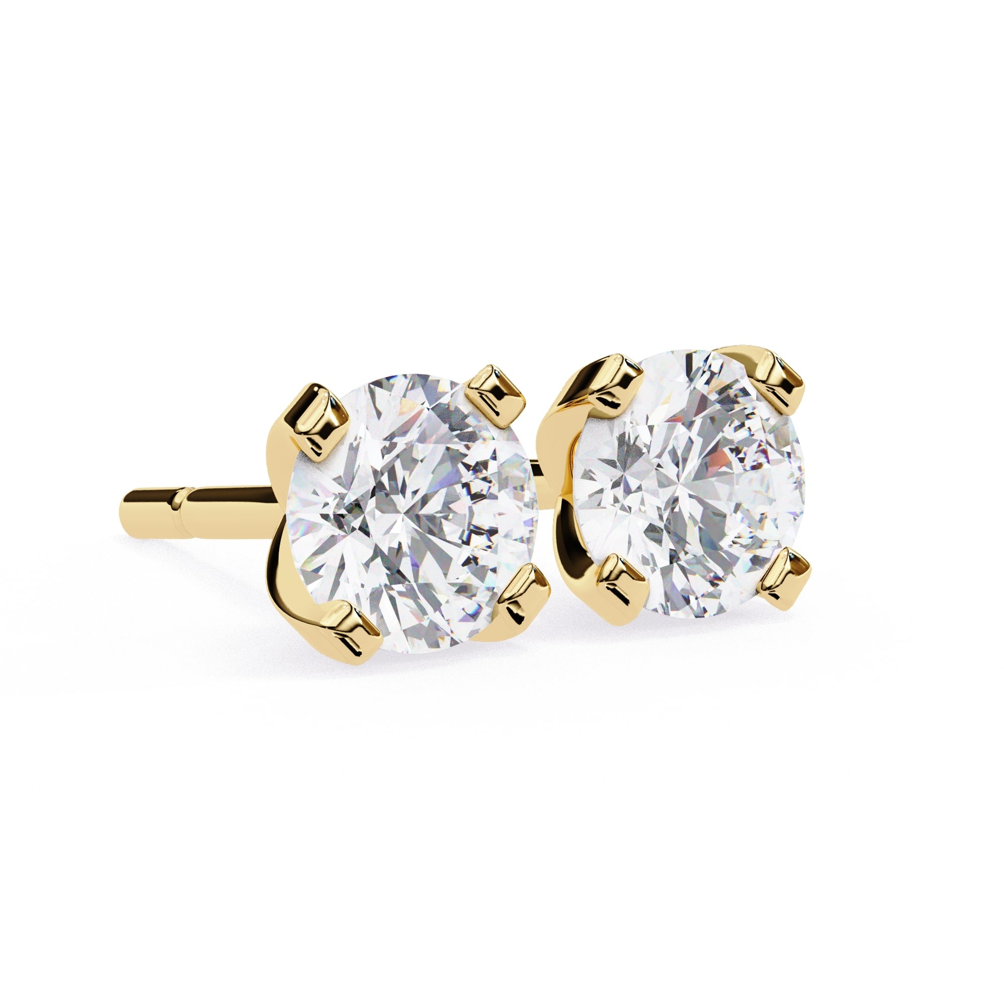 Gold stud earrings with clear gemstones on a white background