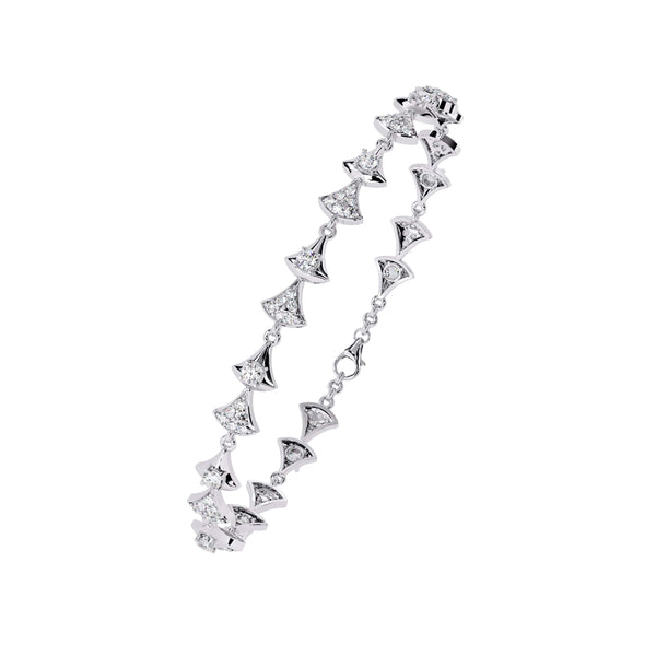 Silver bracelet with diamond-like stones on a white background