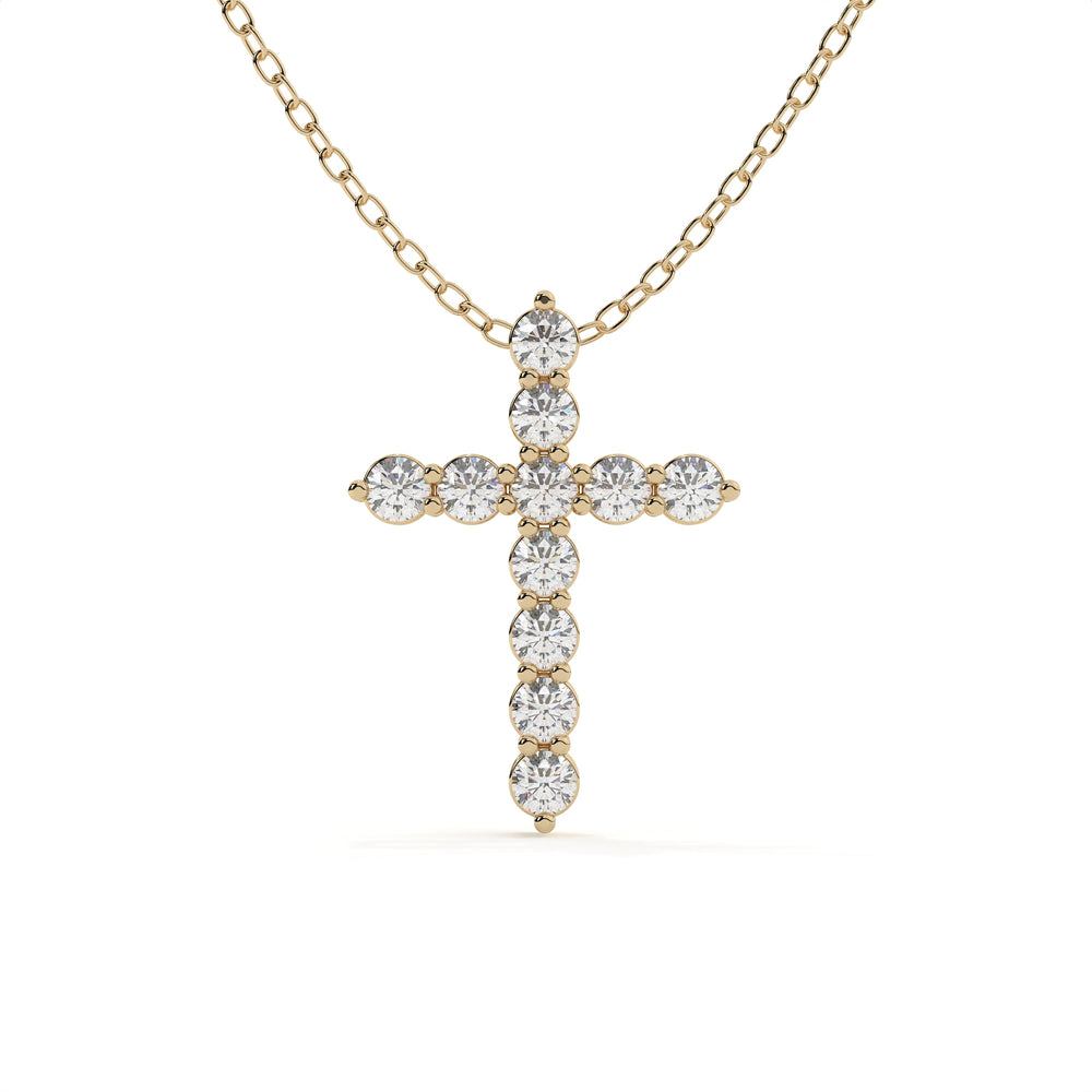 Yellow gold cross pendant featuring round cut lab grown diamonds on a matching gold chain for everyday wear.
