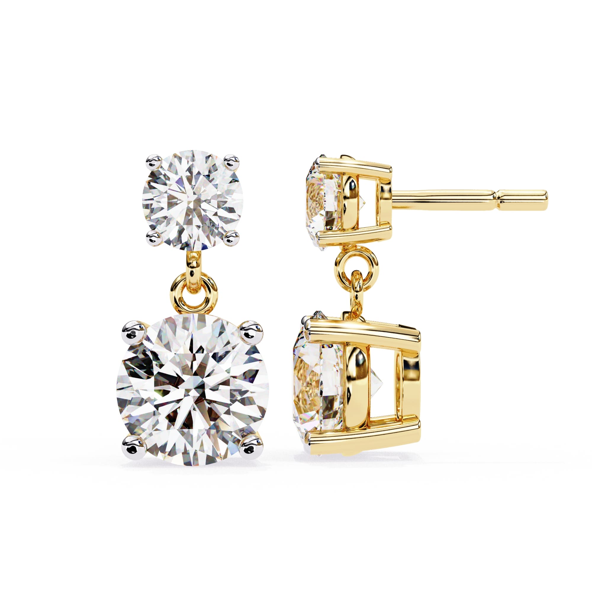 Gold earrings with large clear gemstones on a white background